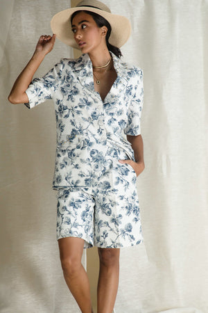 Handcrafted cotton linen shorts in white and blue, featuring a chic silhouette ideal for both professional and casual wear