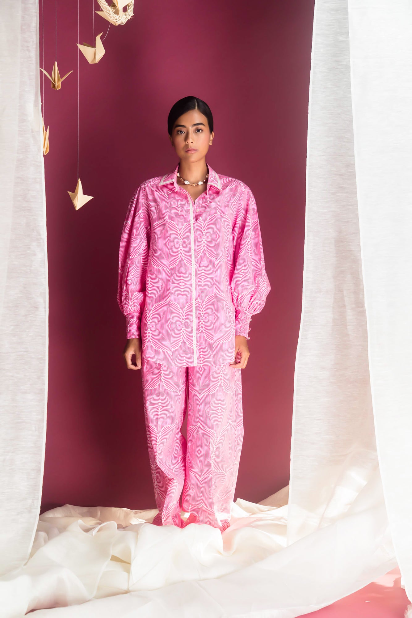 Luxurious pink cotton cambric co-ord set with peasant sleeves, loose fit, and artisan craftsmanship, perfect for elegant summer wear