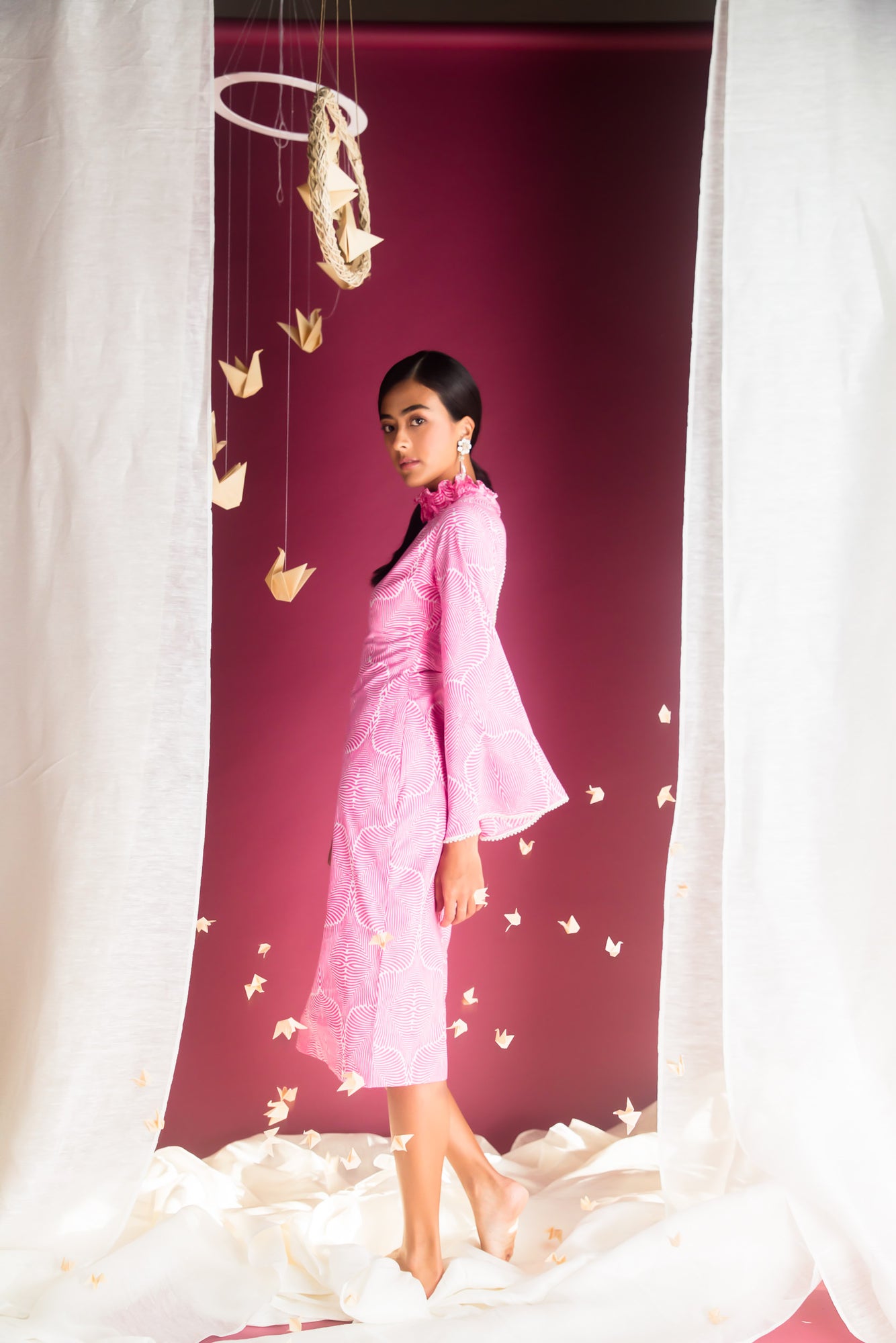 Pink cotton cambric dress with ruffled collar and bell sleeves, showcasing luxury womenswear craftsmanship and elegant design