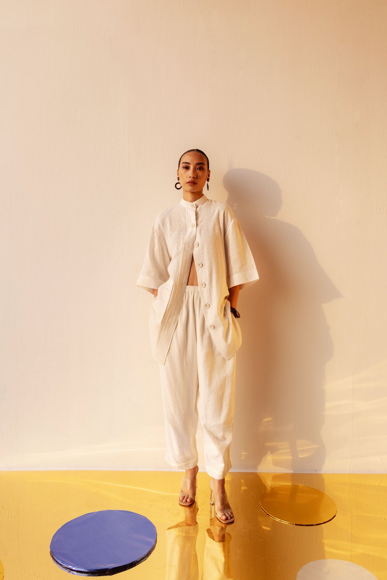 Elegant co-ord set with a mandarin collar, button details, and relaxed fit, crafted from premium Swiss Dot fabric in a sophisticated silhouette