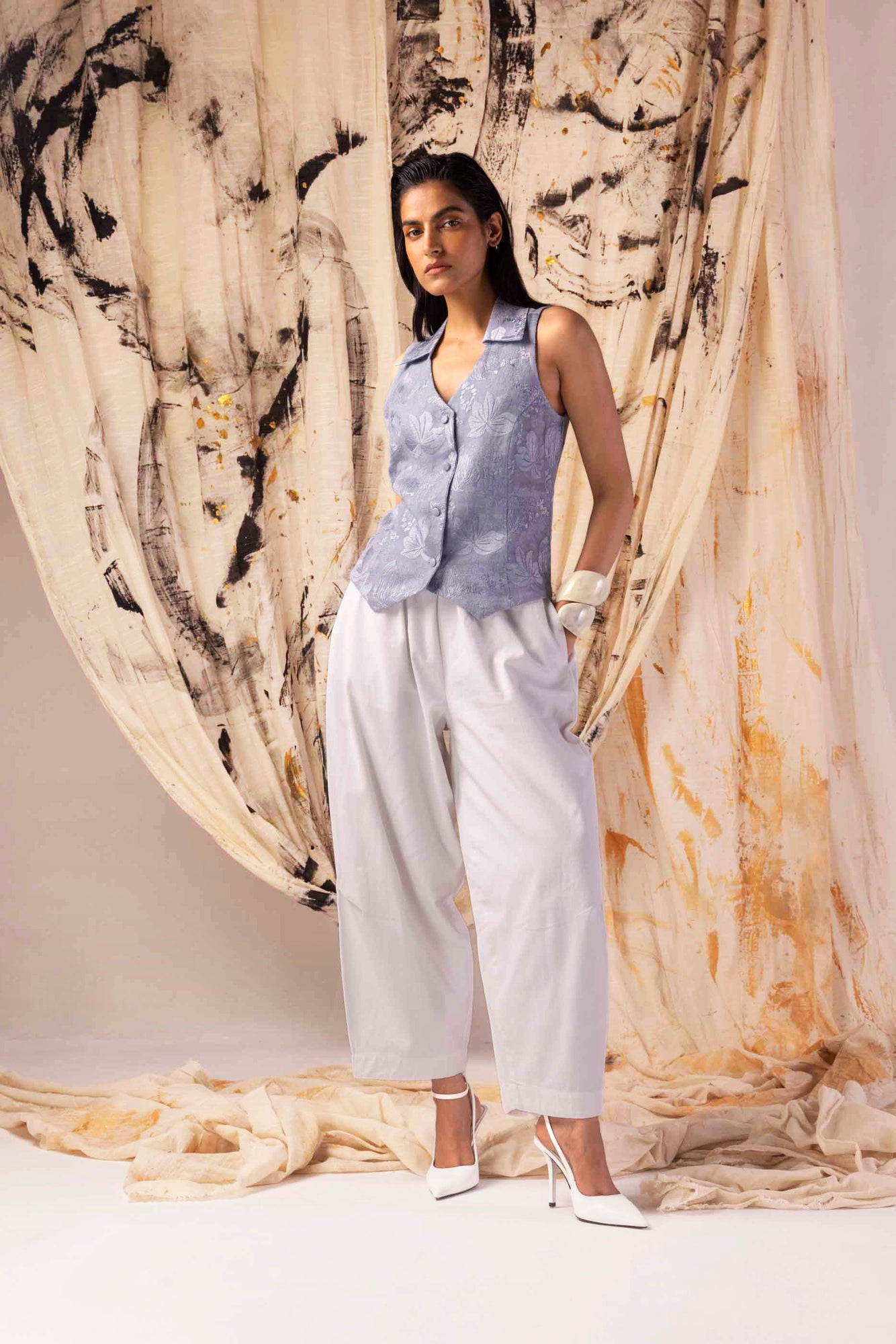 Alpine White Trousers in handloom fabric, showcasing a tailored silhouette and luxurious finish, epitomizing NJ3 Atelier's artisan craftsmanship