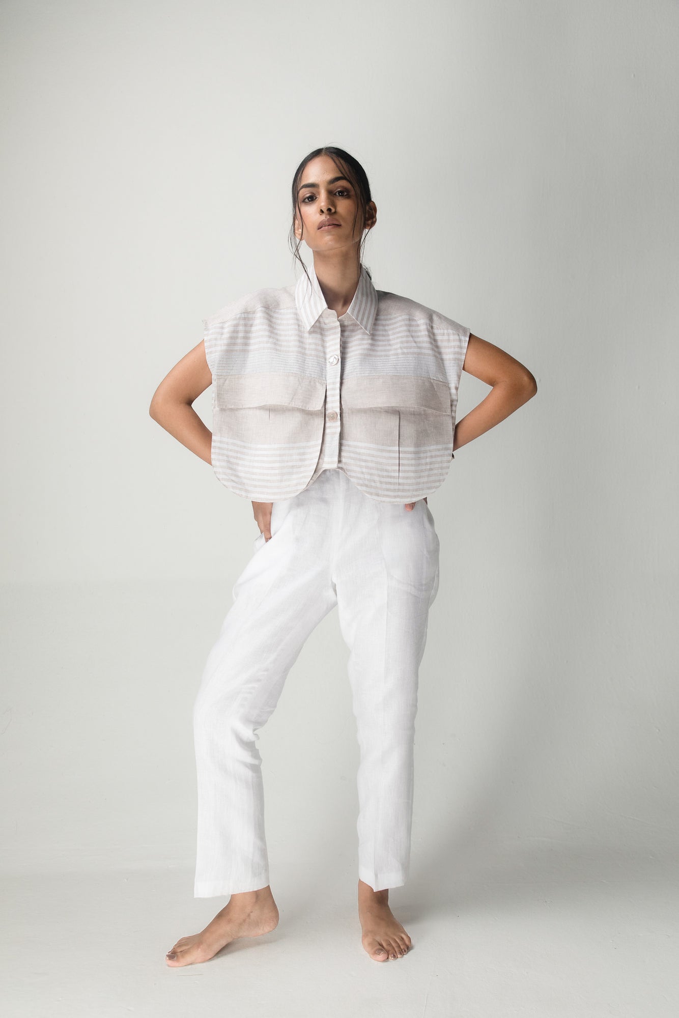 Elegant handcrafted cargo crop shirt in premium fabric, showcasing a chic silhouette and luxury womenswear style by NJ3 Atelier
