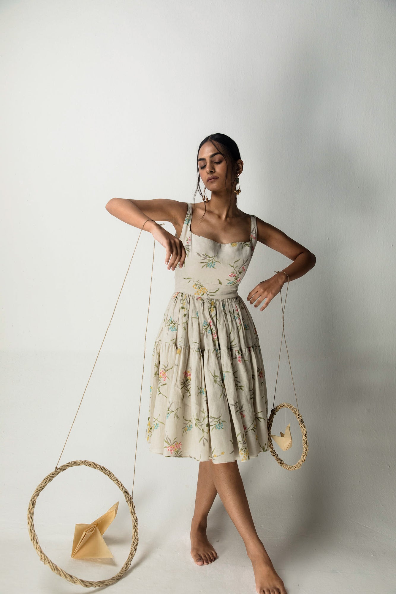 Handcrafted bone short dress in premium fabric, featuring a unique silhouette, epitomizing luxury womenswear by NJ3 Atelier
