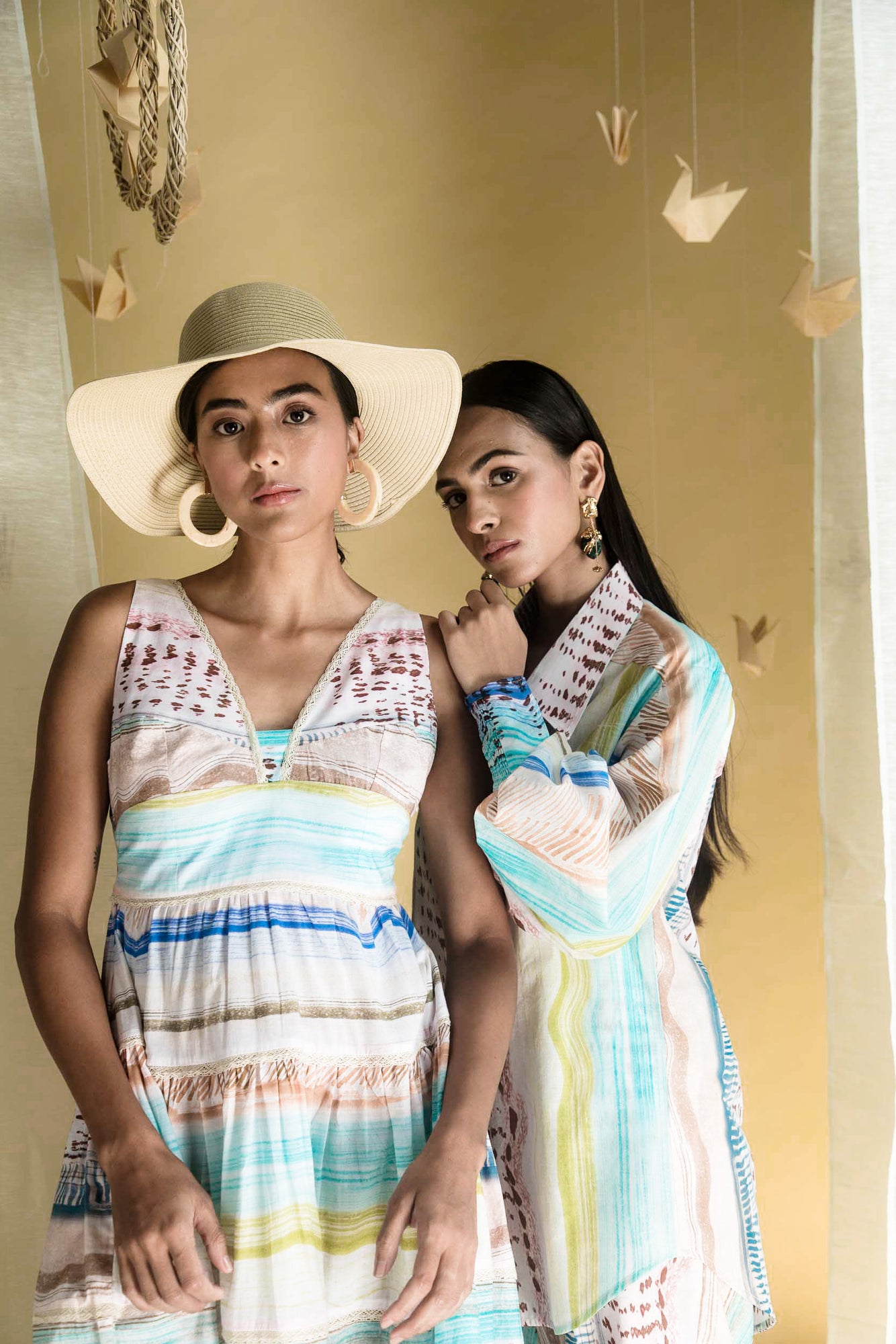 Elegant Moana Long Dress in rich, handloom fabric; features a flowing silhouette and artisan-crafted details, epitomizing luxury womenswear