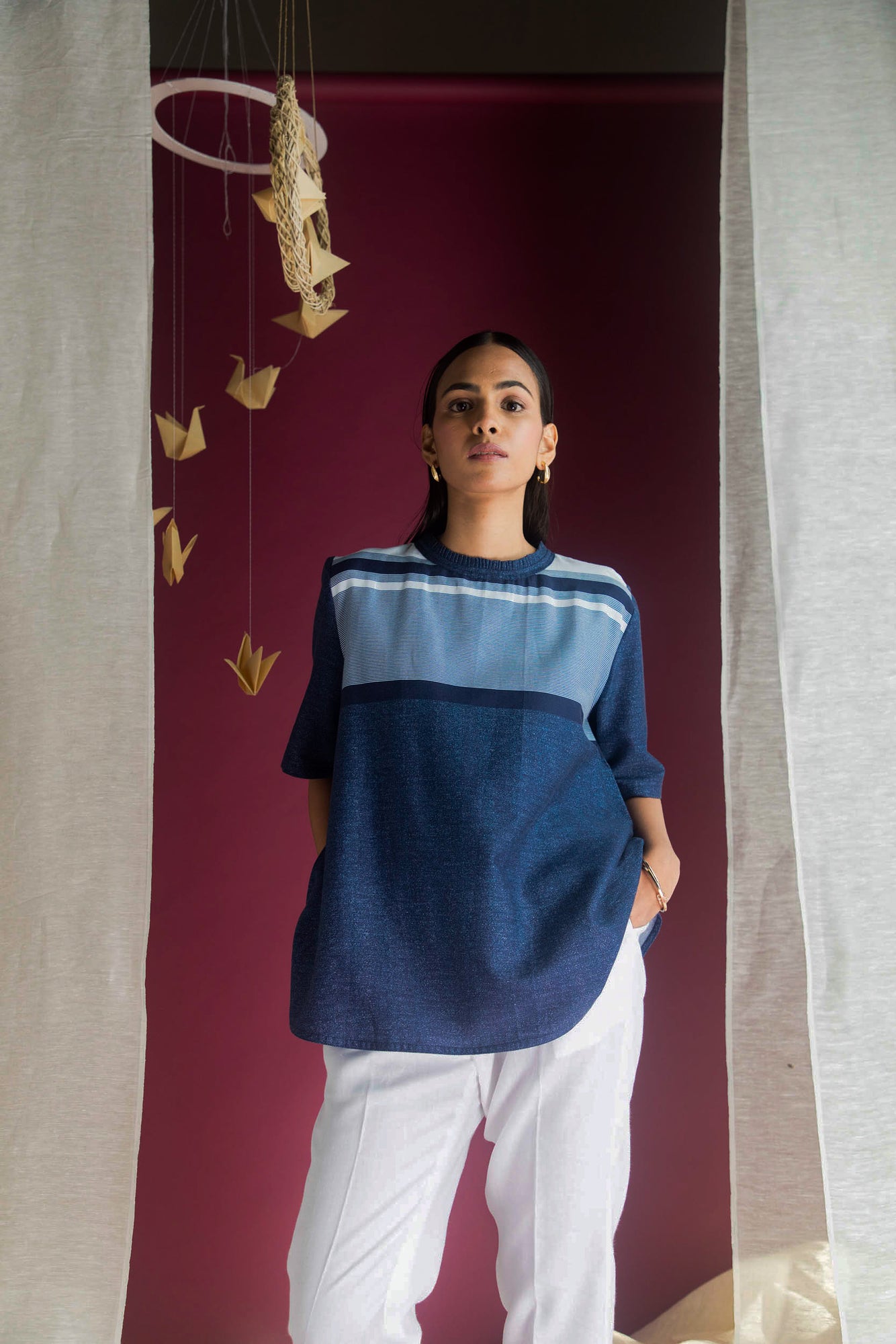 Elegant handcrafted top in premium fabric, showcasing a refined silhouette and exquisite detailing, epitomizing luxury womenswear craftsmanship