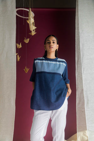 Elegant handcrafted top in premium fabric, showcasing a refined silhouette and exquisite detailing, epitomizing luxury womenswear craftsmanship