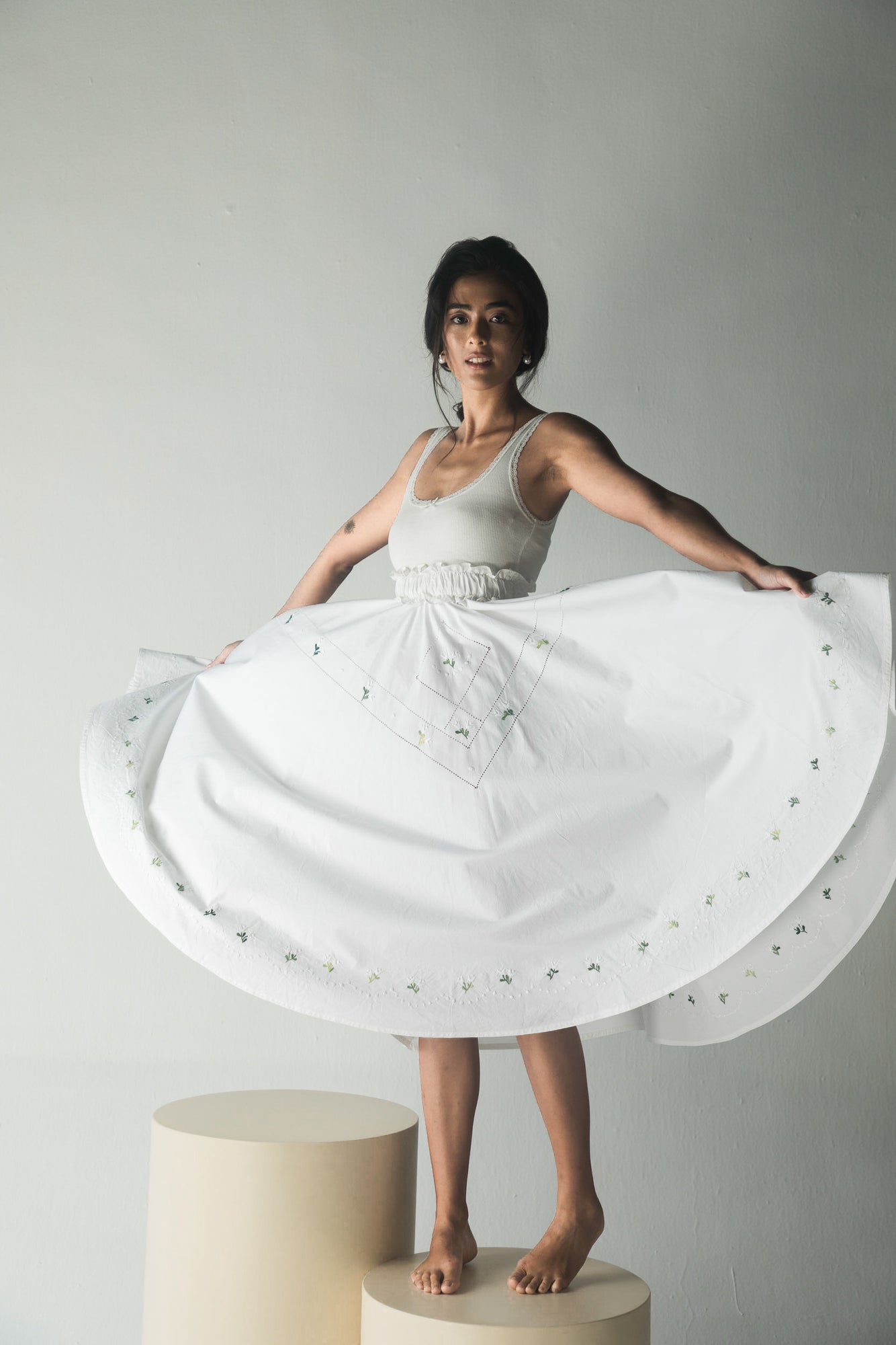 Elegant handcrafted paper short skirt in premium fabric, showcasing a chic silhouette and luxurious design for sophisticated womenswear