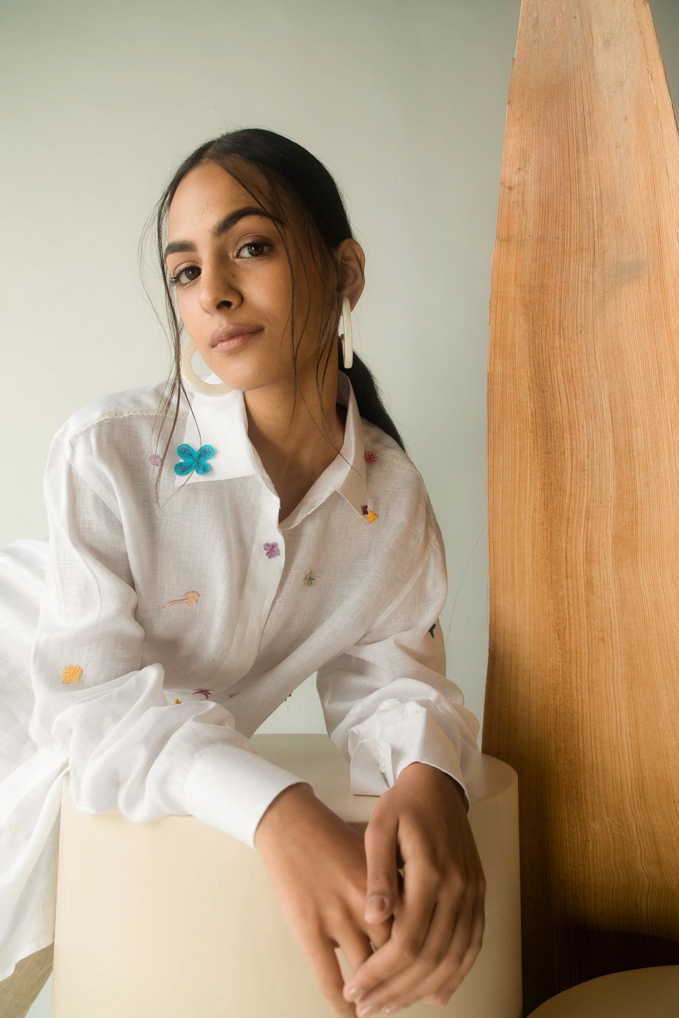 Elegant handloom-crafted women's shirt in premium fabric, showcasing a sophisticated doodle dot pattern, epitomizing luxury artisan fashion