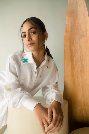 Elegant handloom-crafted women's shirt in premium fabric, showcasing a sophisticated doodle dot pattern, epitomizing luxury artisan fashion