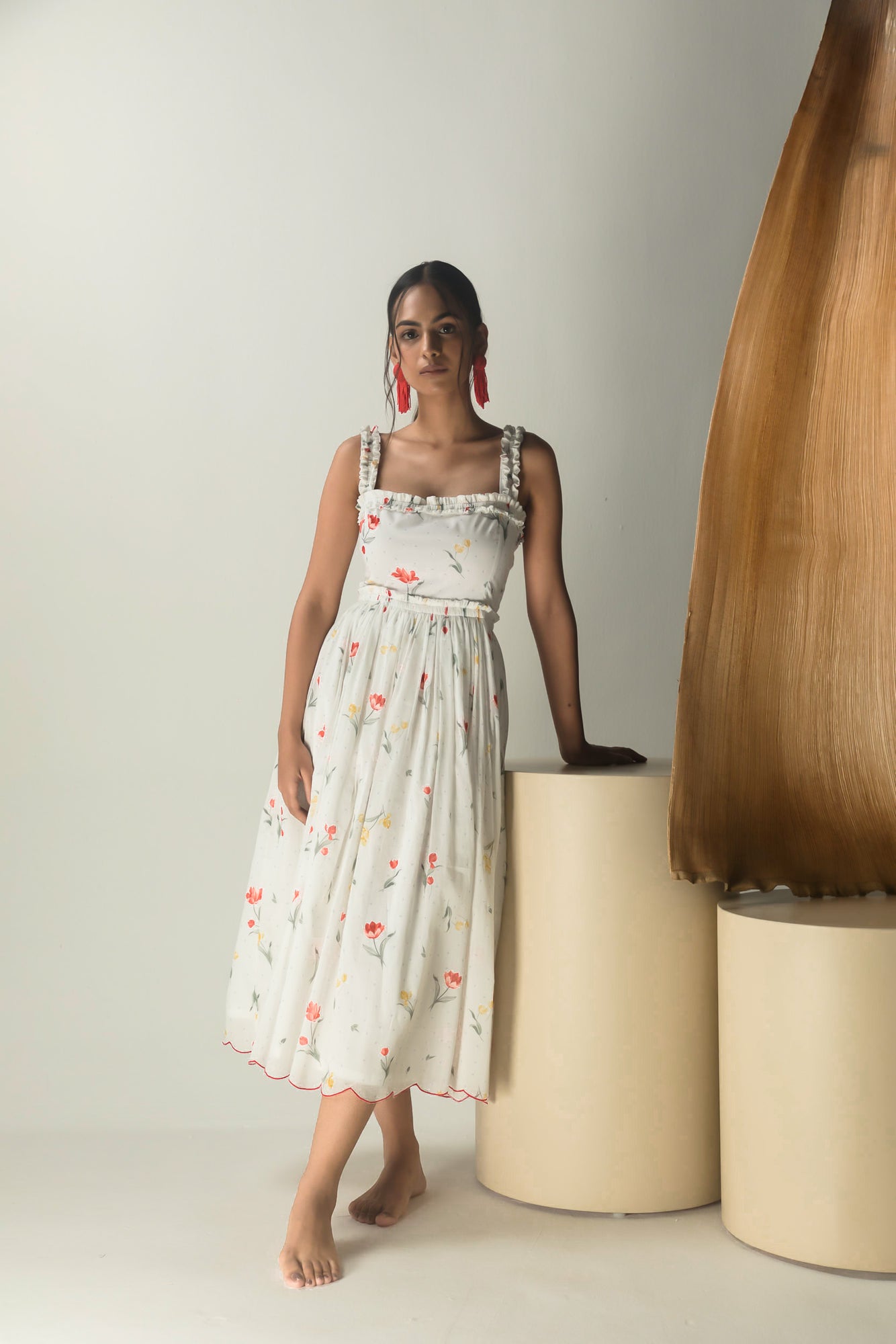 Elegant Gardenia Midi Dress in soft handloom fabric, showcasing a flowing silhouette and artisan-crafted details for luxury womenswear