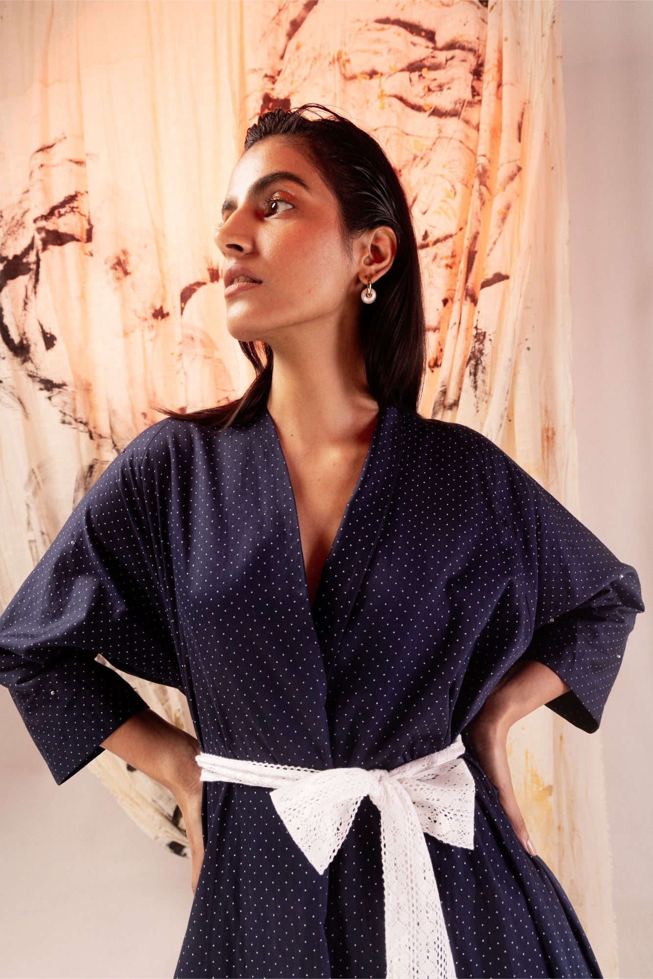 Elegant azure satin dress with a sleek silhouette, handcrafted for luxury womenswear; a testament to artisan craftsmanship