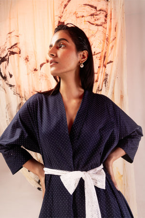 Elegant azure satin dress with a sleek silhouette, handcrafted for luxury womenswear; a testament to artisan craftsmanship