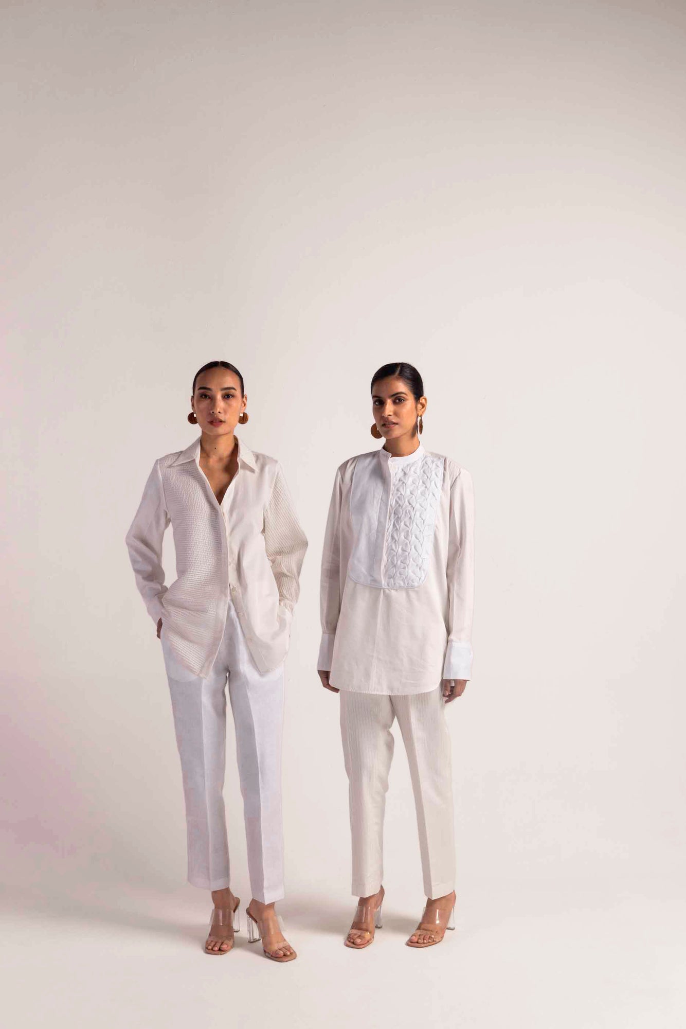 Luxurious handcrafted pinstripe shirt in pristine white, showcasing NJ3 Atelier's artisan craftsmanship and premium fabric elegance