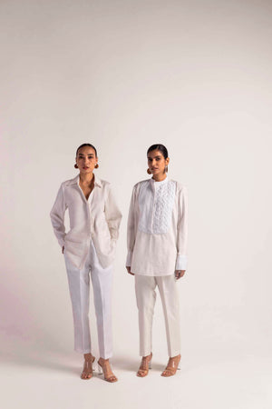 Luxurious handcrafted pinstripe shirt in pristine white, showcasing NJ3 Atelier's artisan craftsmanship and premium fabric elegance