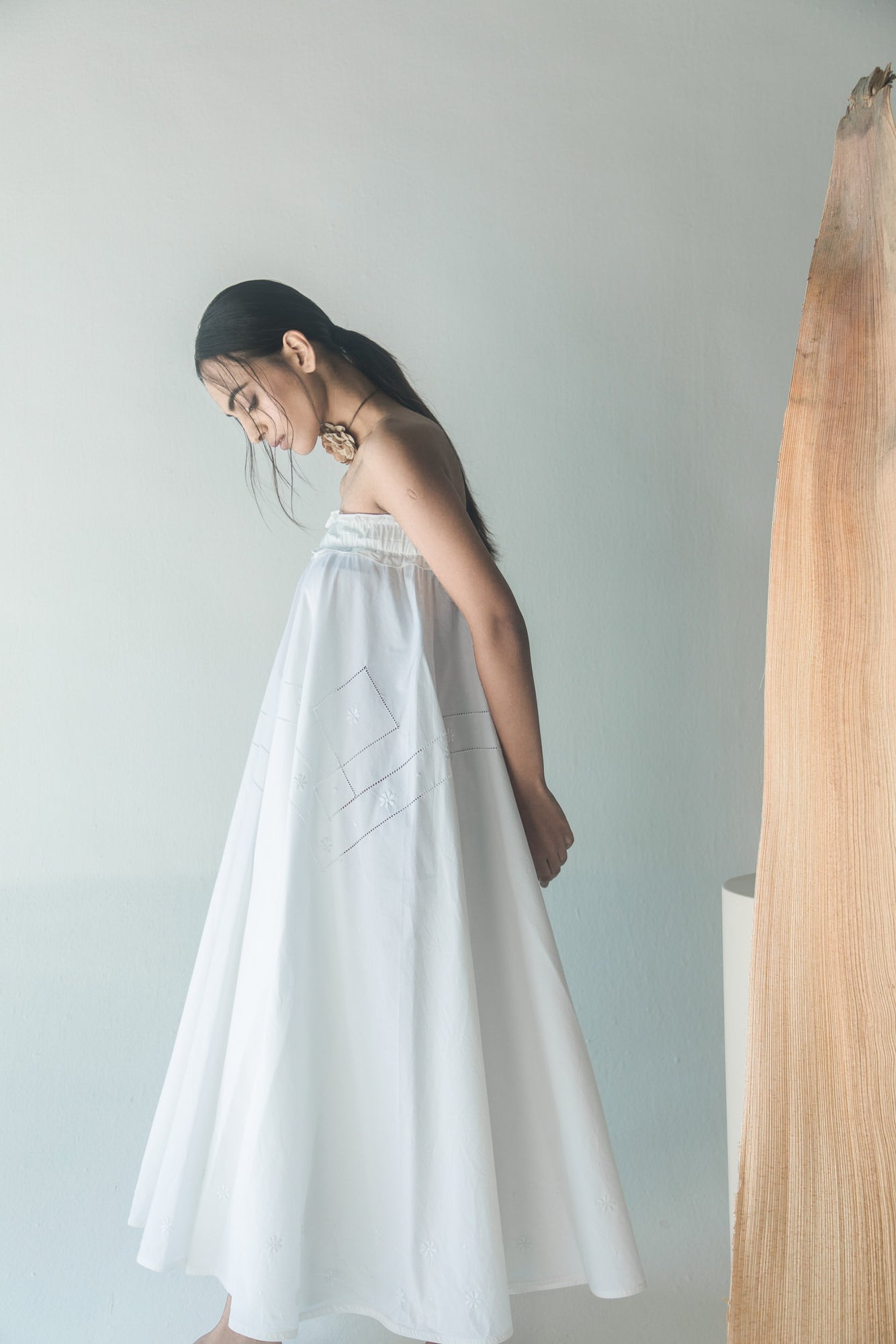 Elegant handloom paper long skirt in soft hues, showcasing artisan craftsmanship and premium fabric for luxury womenswear enthusiasts