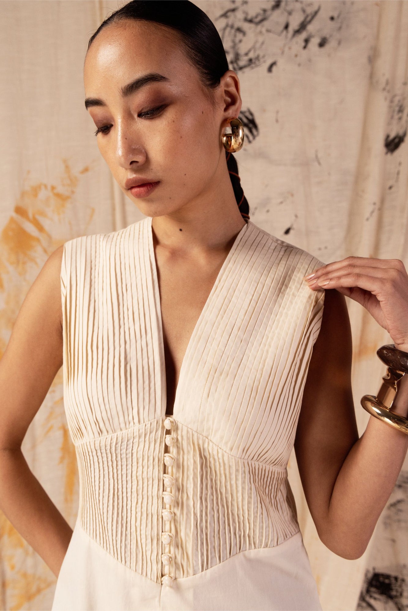 Petal yellow pleated dress in premium fabric, showcasing luxury womenswear with an elegant silhouette and artisan craftsmanship