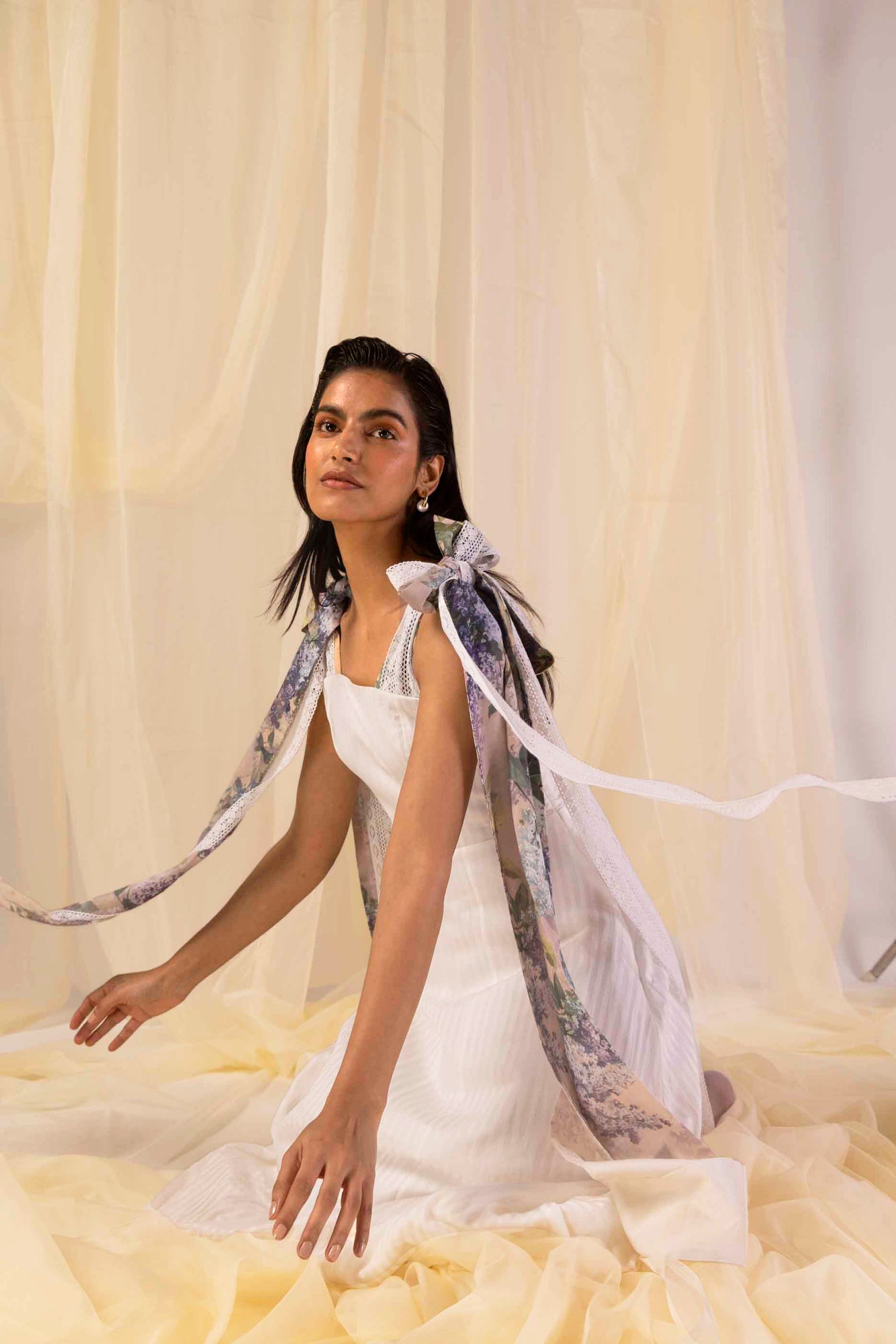 "Valencia Stripe Hydra Hues flared dress in vibrant handloom stripes, showcasing a luxurious silhouette and artisan craftsmanship."