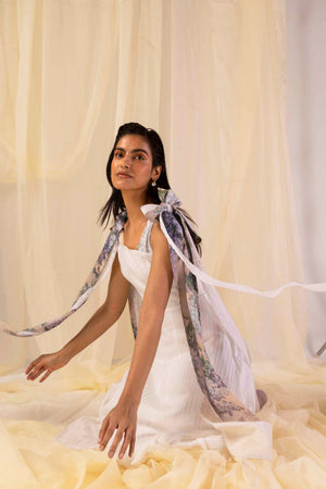"Valencia Stripe Hydra Hues flared dress in vibrant handloom stripes, showcasing a luxurious silhouette and artisan craftsmanship."