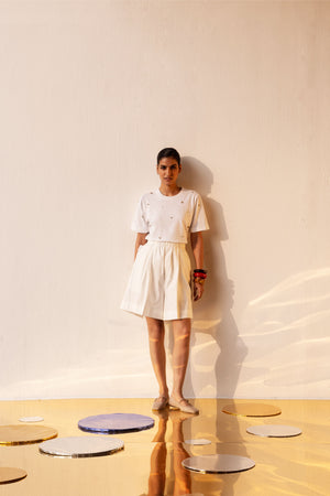 Elegant Celia Origami Shorts in handloom fabric, showcasing a chic silhouette with intricate artisan detailing, perfect for luxury womenswear