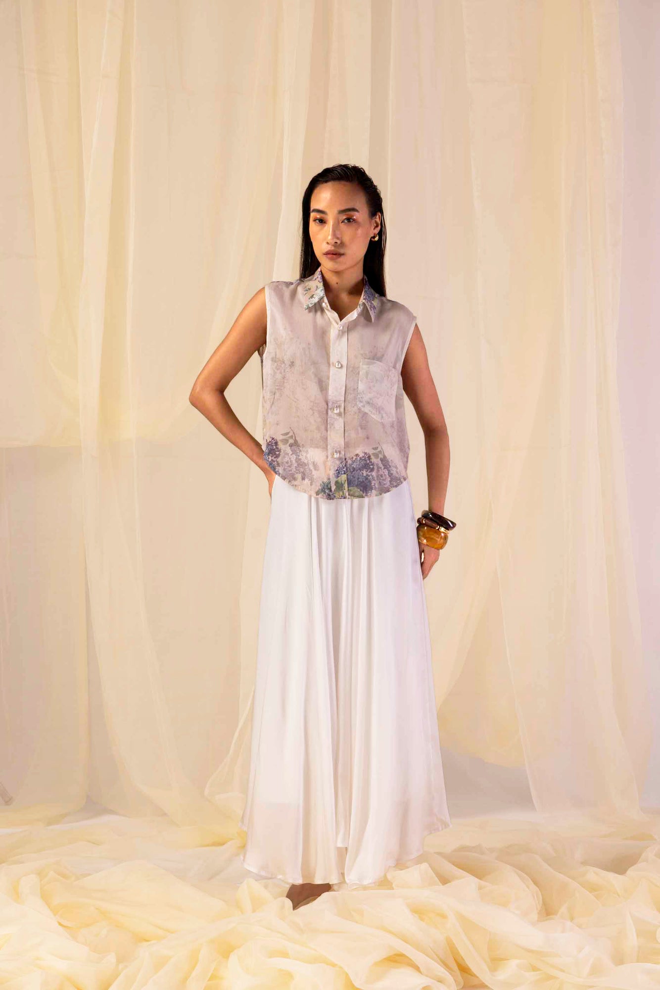 Elegant handloom short shirt in premium fabric, showcasing a refined silhouette with artisan-crafted details, epitomizing luxury womenswear