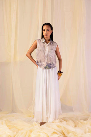 Elegant handloom short shirt in premium fabric, showcasing a refined silhouette with artisan-crafted details, epitomizing luxury womenswear