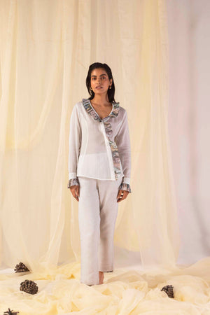 "Valencia Hydra Hues Ruffle Shirt in vibrant handloom fabric, showcasing exquisite ruffle detail and premium craftsmanship for luxury womenswear."