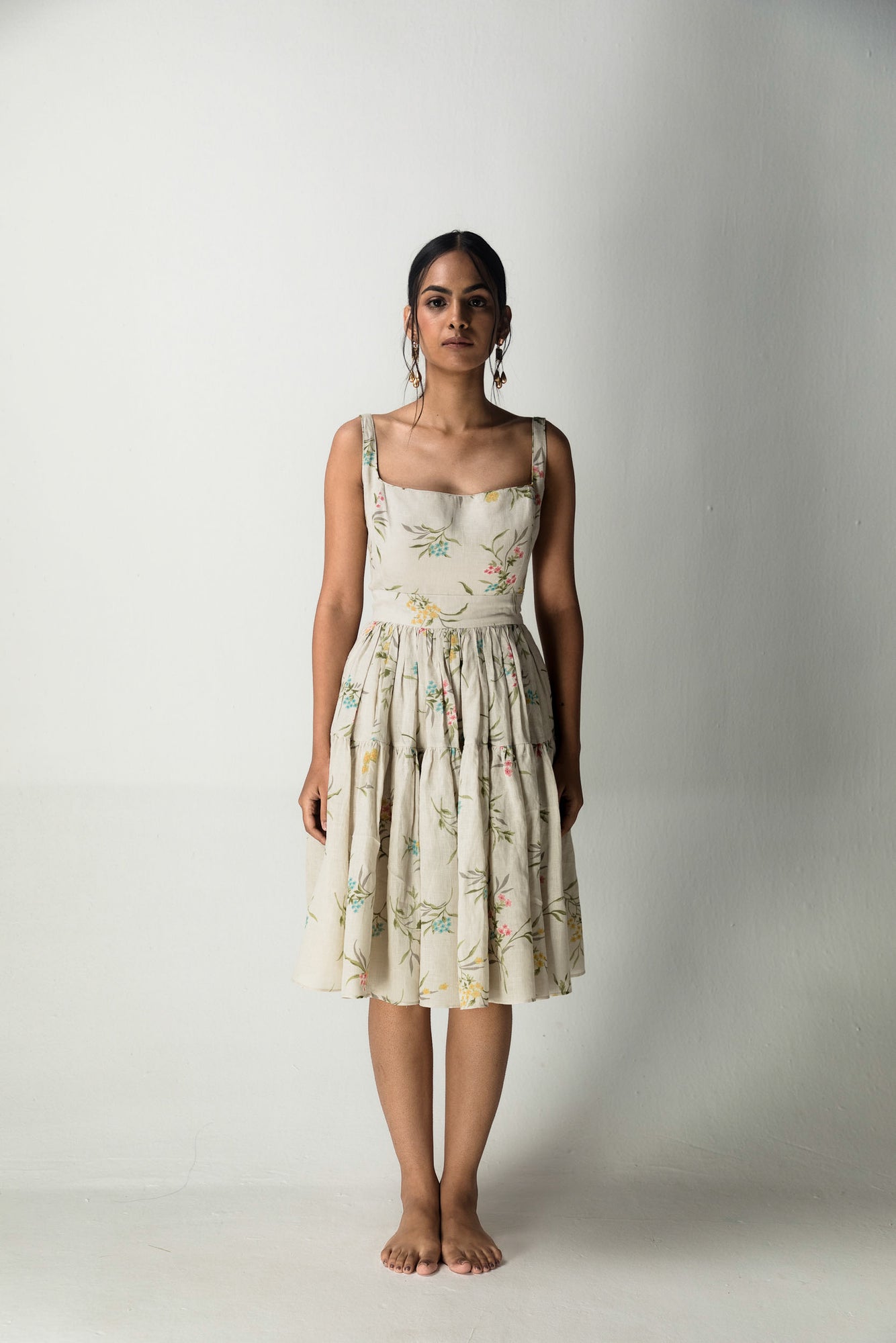 Elegant bone short dress in premium handloom fabric, showcasing a refined silhouette and exquisite artisan craftsmanship