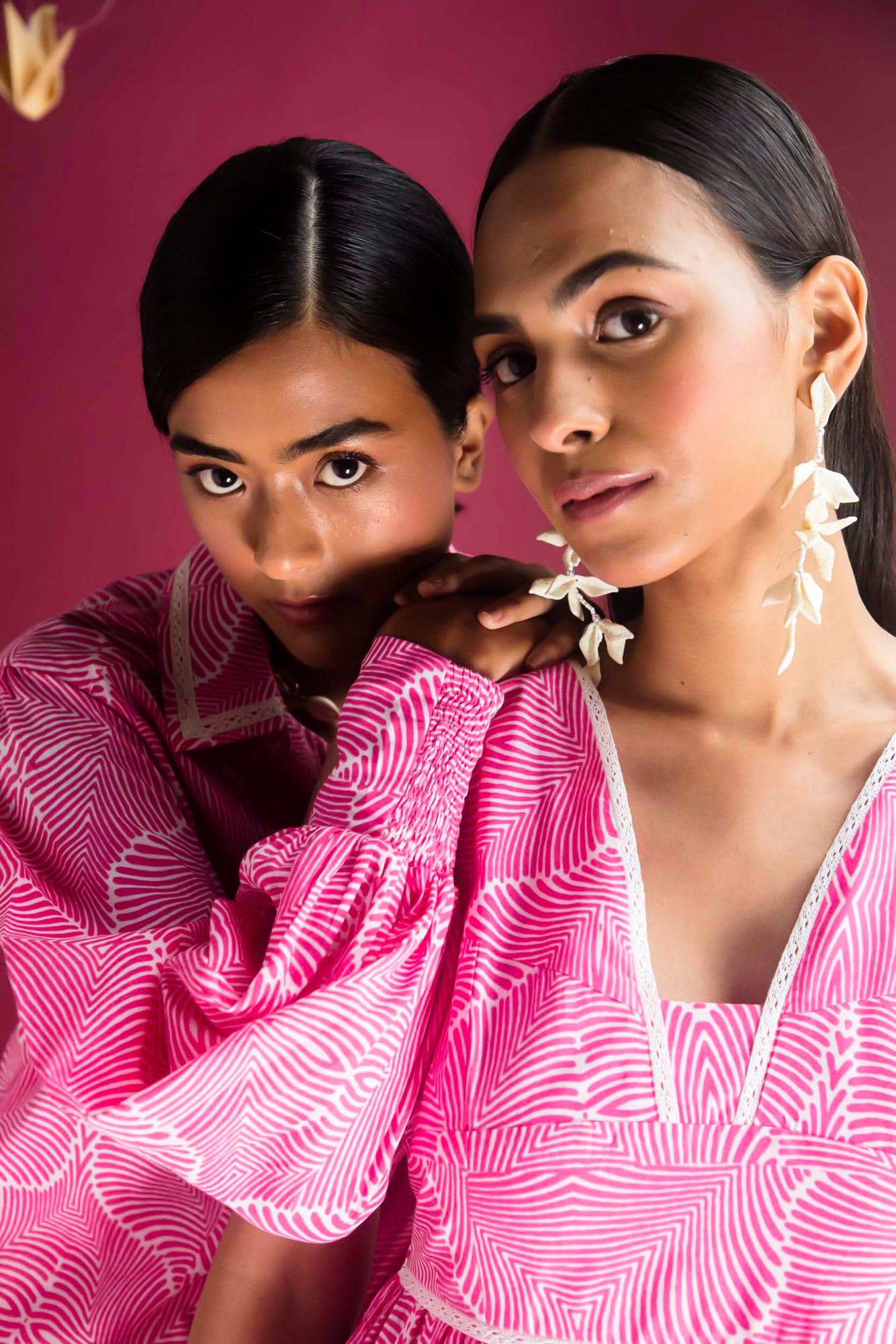 Elegant Flora Pink Dress in premium handloom fabric, showcasing a flowing silhouette with artisan-crafted details, embodying luxury womenswear
