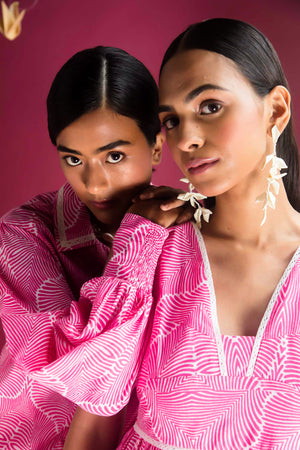Elegant Flora Pink Dress in premium handloom fabric, showcasing a flowing silhouette with artisan-crafted details, embodying luxury womenswear