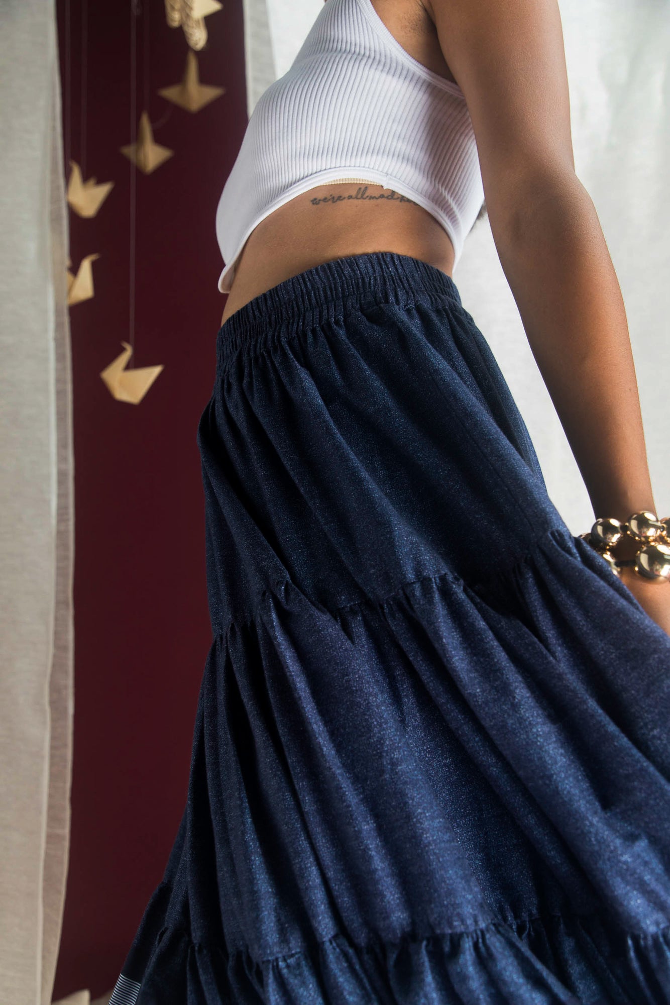 Elegant handloom skirt in crystal-clear hue, showcasing premium fabric and intricate artisan craftsmanship, epitomizing luxury womenswear
