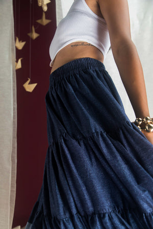 Elegant handloom skirt in crystal-clear hue, showcasing premium fabric and intricate artisan craftsmanship, epitomizing luxury womenswear