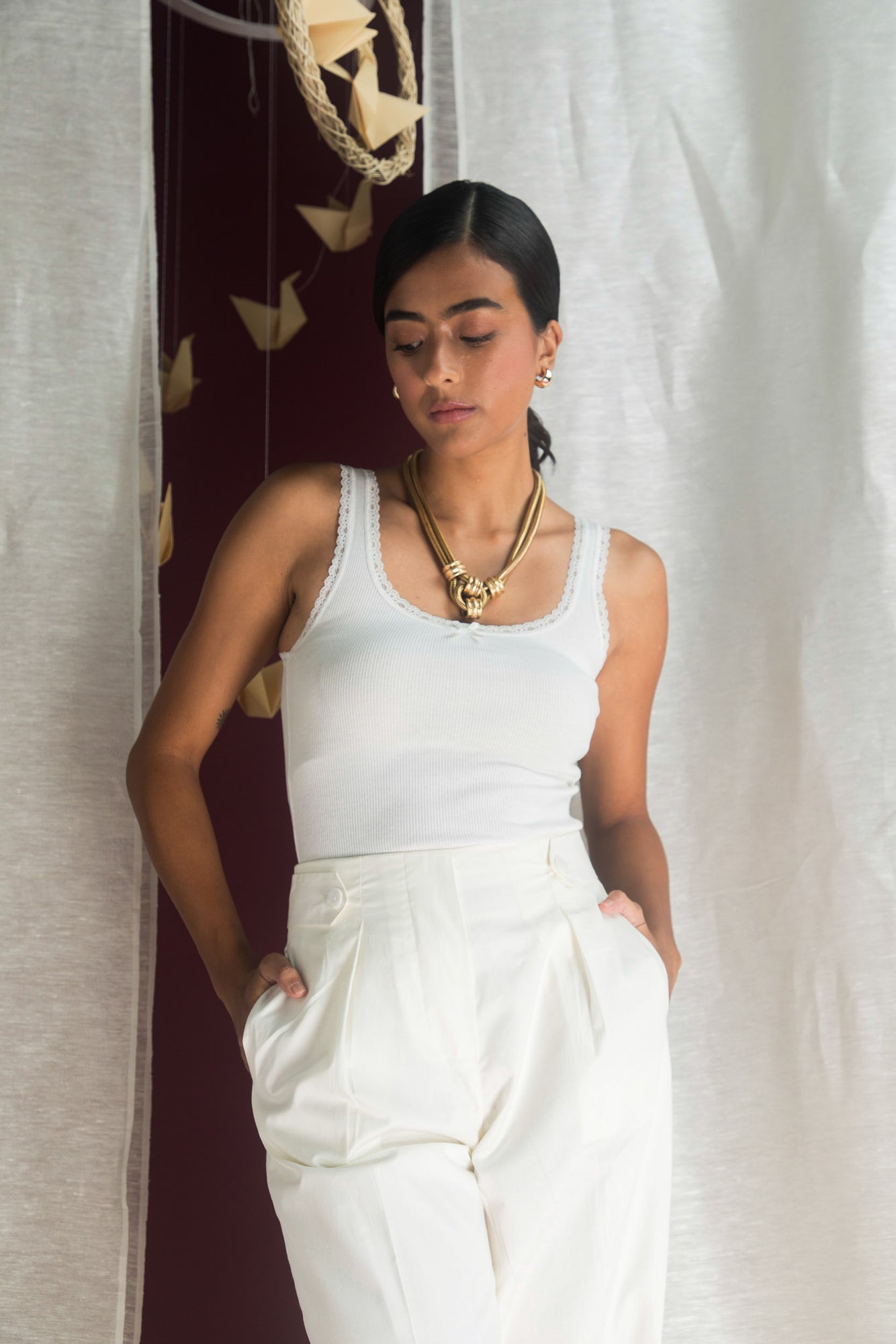 Elegant handloom trousers in premium fabric, showcasing a tailored silhouette and artisan craftsmanship, epitomizing luxury womenswear