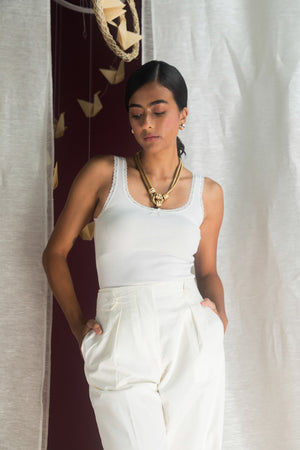 Elegant handloom trousers in premium fabric, showcasing a tailored silhouette and artisan craftsmanship, epitomizing luxury womenswear