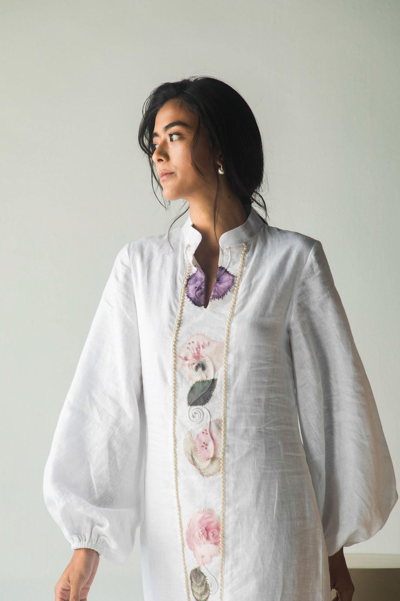 Elegant white shirt in premium handloom fabric, showcasing NJ3 Atelier's luxury womenswear with a tailored silhouette and artisan craftsmanship