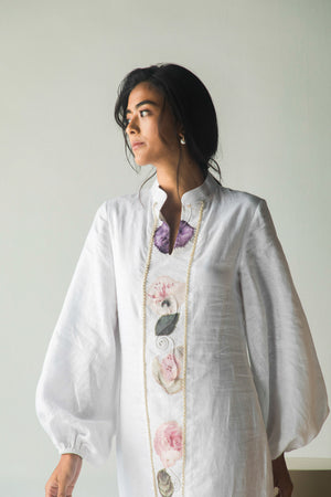 Elegant white shirt in premium handloom fabric, showcasing NJ3 Atelier's luxury womenswear with a tailored silhouette and artisan craftsmanship