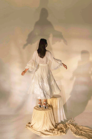 Elegant handloom pearl white skirt with a tailored tuck design, showcasing NJ3 Atelier's luxury artisan craftsmanship