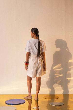 Celia Origami Shorts in premium handloom fabric, showcasing a chic silhouette with intricate artisan detailing, embodying luxury womenswear