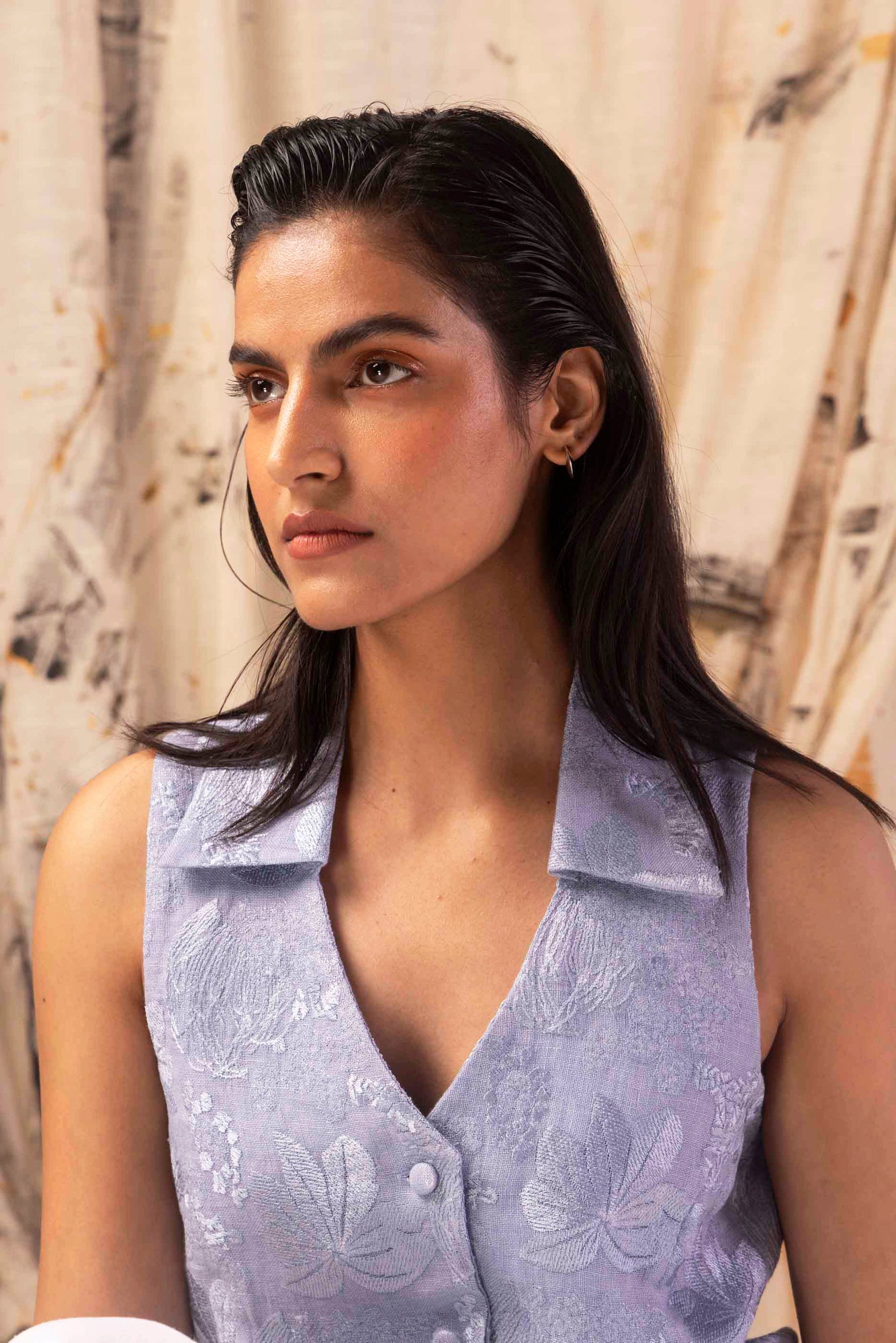 Powder sky linen waistcoat in premium handloom fabric, showcasing exquisite craftsmanship and elegant silhouette for luxury womenswear