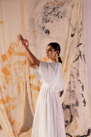Elegant Valencia Fluid Dress in rich, handloom fabric; showcases a flowing silhouette, epitome of luxury womenswear craftsmanship
