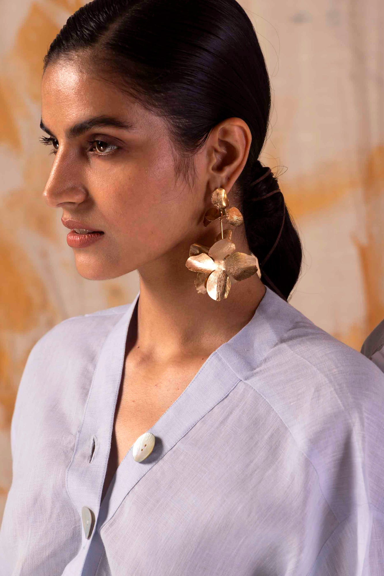 Powder blue coord set in premium handloom fabric, showcasing an elegant silhouette with artisan-crafted details, epitomizing luxury womenswear