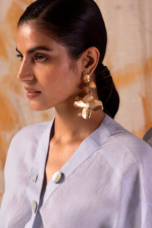 Powder blue coord set in premium handloom fabric, showcasing an elegant silhouette with artisan-crafted details, epitomizing luxury womenswear