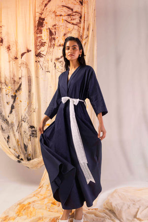 Azure satin dress with delicate dot pattern, showcasing elegant silhouette and premium fabric, epitomizing luxury womenswear craftsmanship