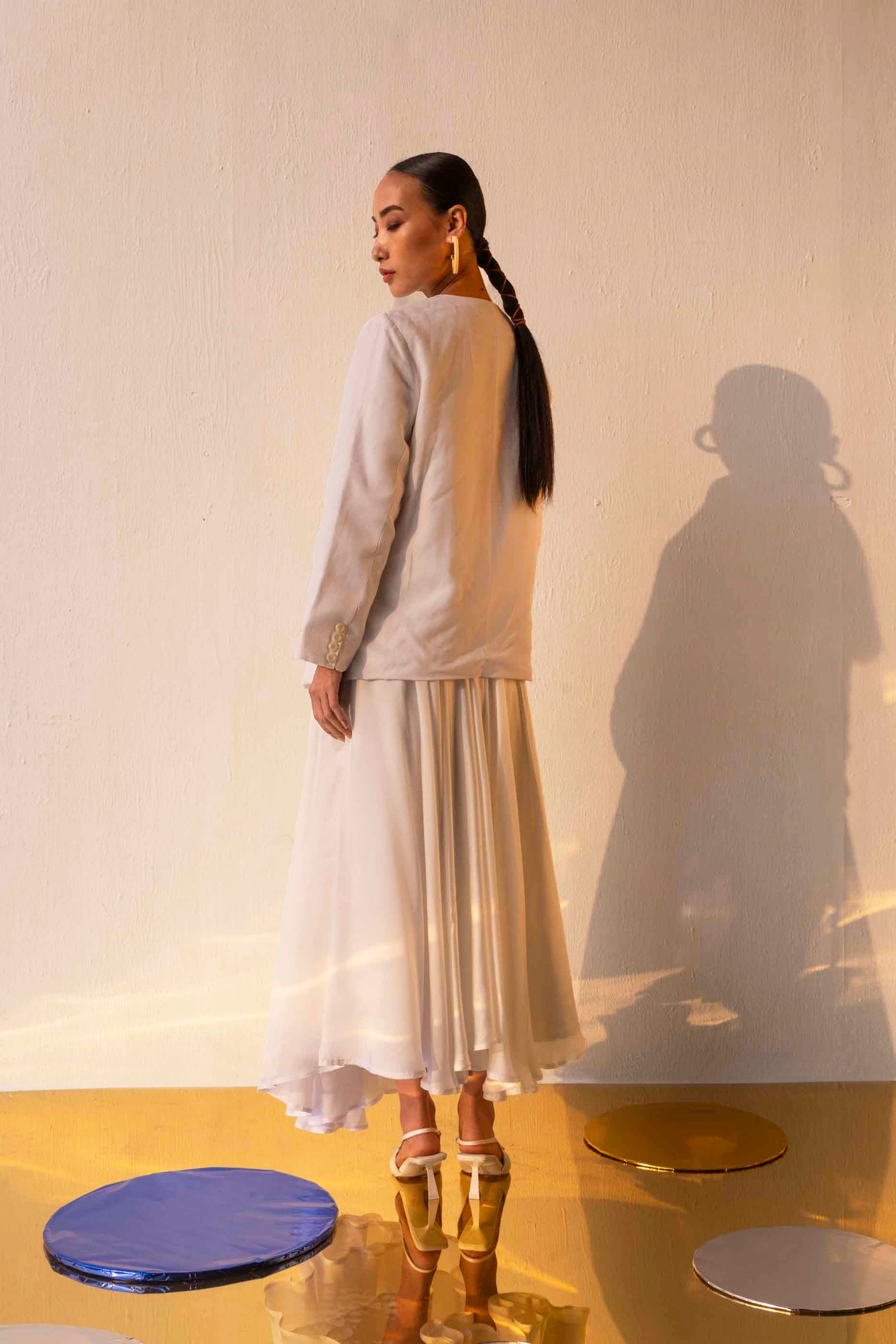 Elegant handloom frosted skirt in premium fabric, showcasing a flowing silhouette and artisan craftsmanship, epitomizing luxury womenswear