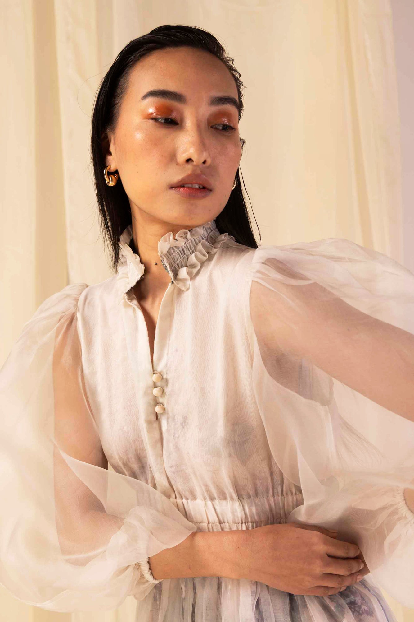 Handcrafted buttery moss dress in premium fabric, showcasing an elegant silhouette with artisan detailing, epitomizing luxury womenswear