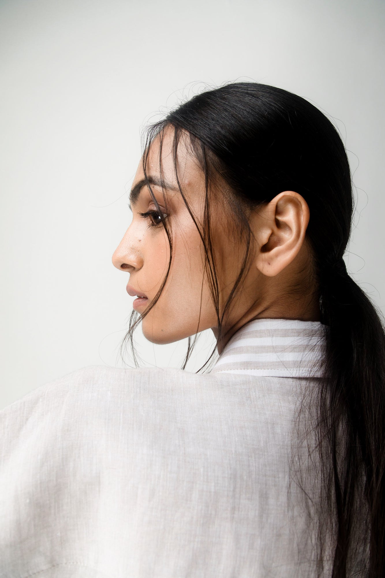 Elegant handcrafted cargo crop shirt in premium fabric, showcasing luxury womenswear with artisan detailing and refined silhouette