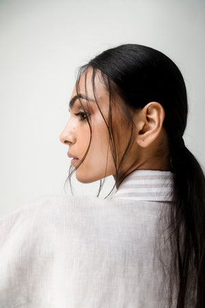 Elegant handcrafted cargo crop shirt in premium fabric, showcasing luxury womenswear with artisan detailing and refined silhouette
