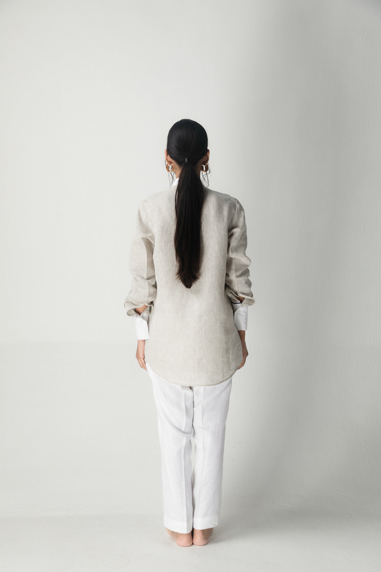 Close-up of the handloom fabric on the Brick Moon Shirt, showcasing its intricate weave and luxurious texture, epitomizing artisan craftsmanship