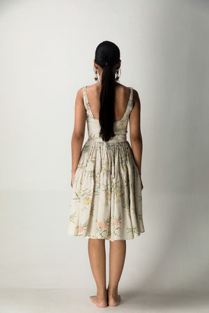 Elegant bone short dress in premium handloom fabric, showcasing a refined silhouette and exquisite artisan craftsmanship