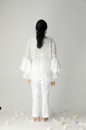 "Elegant handloom garlic shirt in premium fabric, showcasing NJ3 Atelier's luxury womenswear with a refined silhouette and artisan craftsmanship."