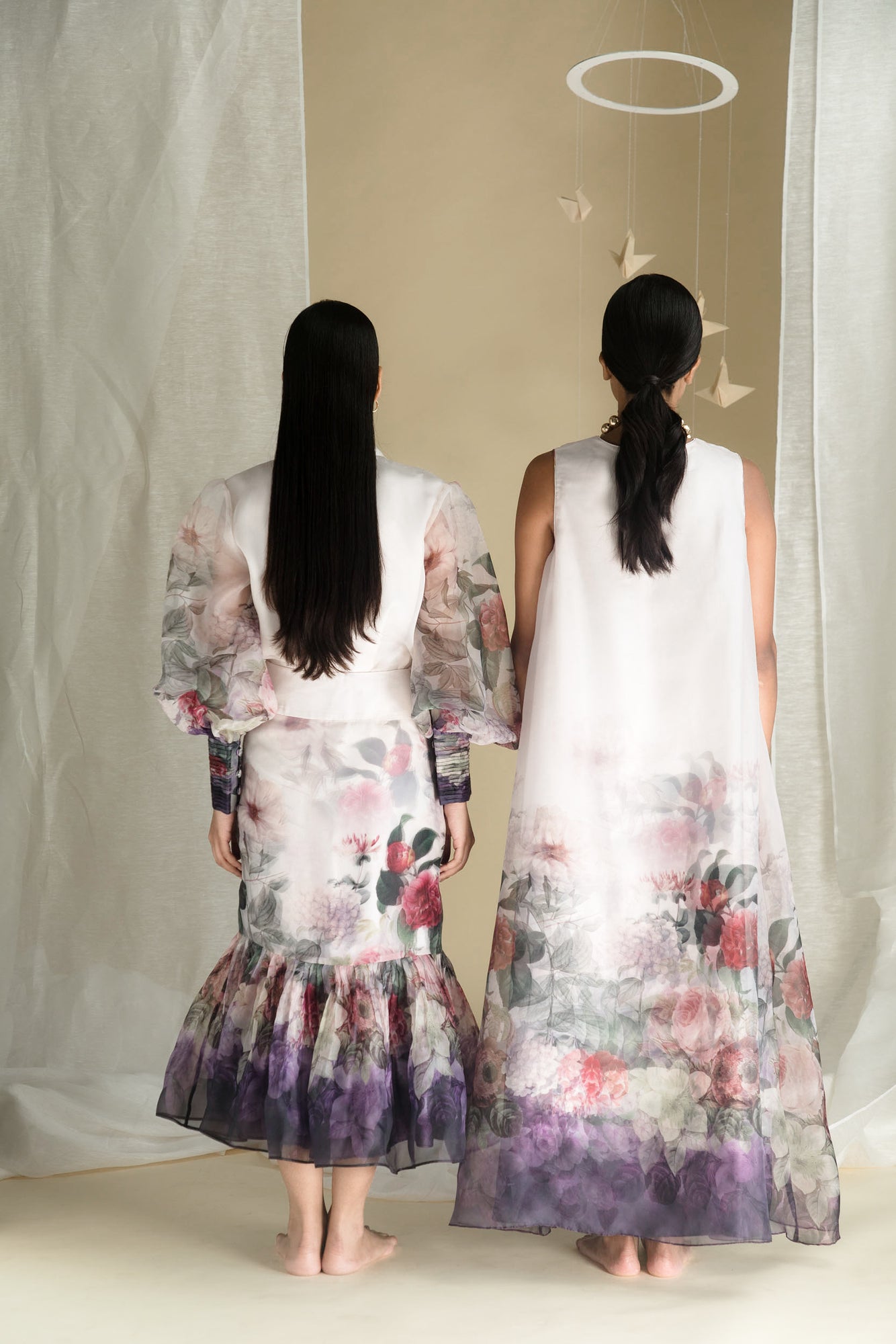 Elegant organza dress with a flowing silhouette, showcasing handcrafted details and premium fabric, epitomizing luxury womenswear